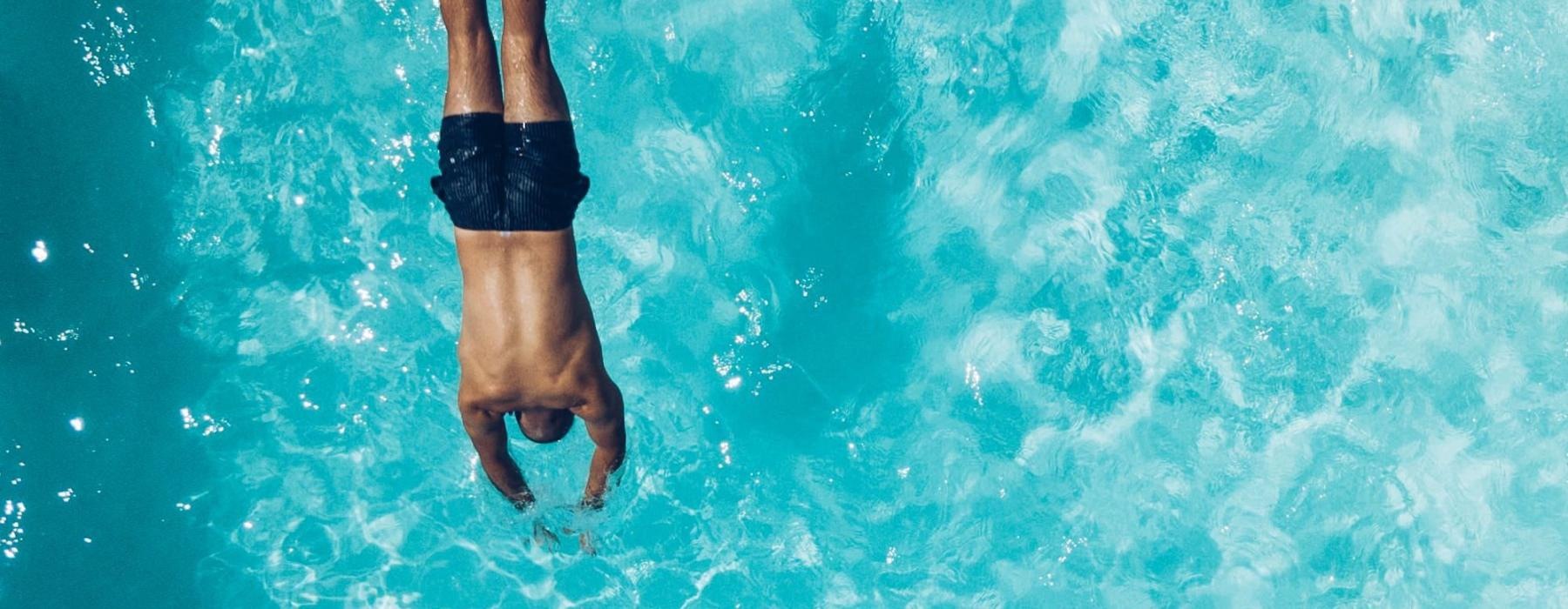 a man swimming in the water